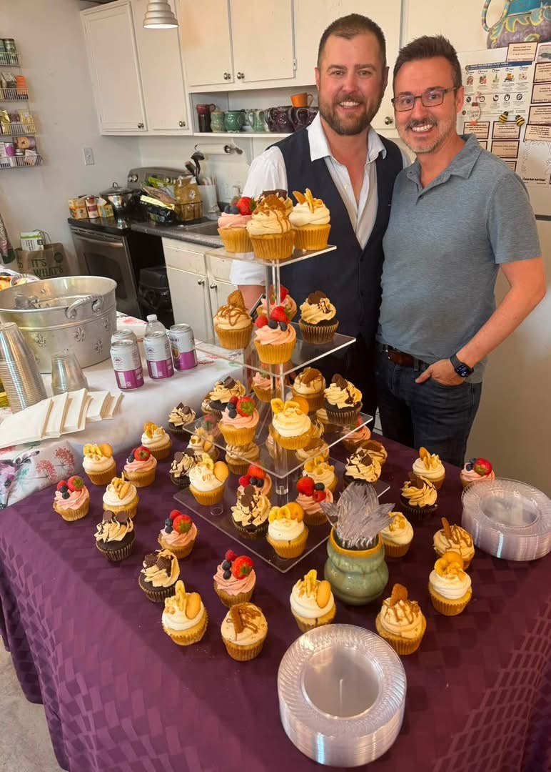 Jeremy with a large cupcake dessert display